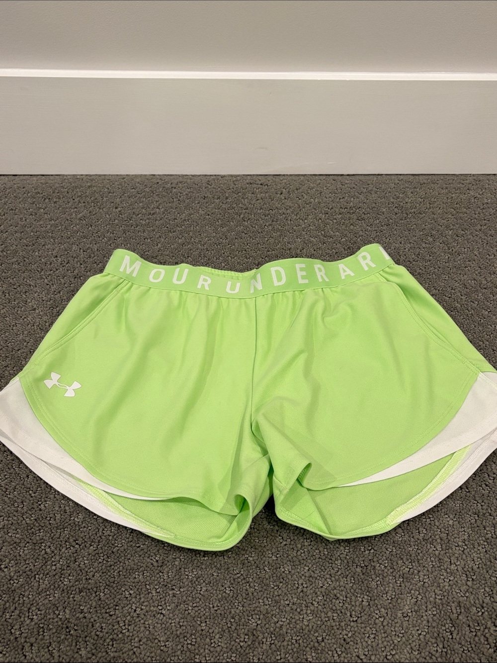 Under Armour Women's Neon Green Athletic Shorts with White Trim and Pockets